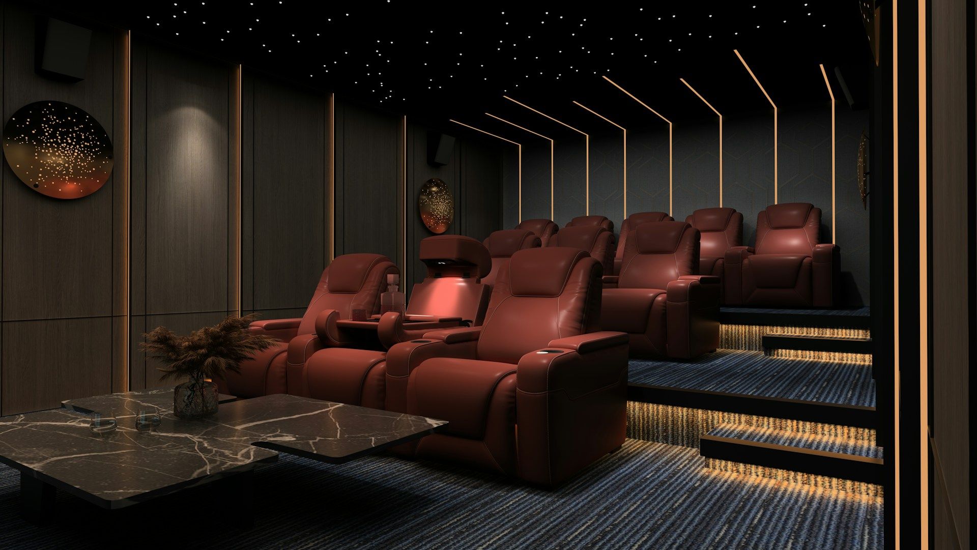 Luxury home theater with tiered seating, featuring red leather recliners, ambient LED strip lighting, a starry ceiling effect, and modern wall decor.